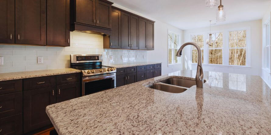 stainless steel sink on a kitchen island